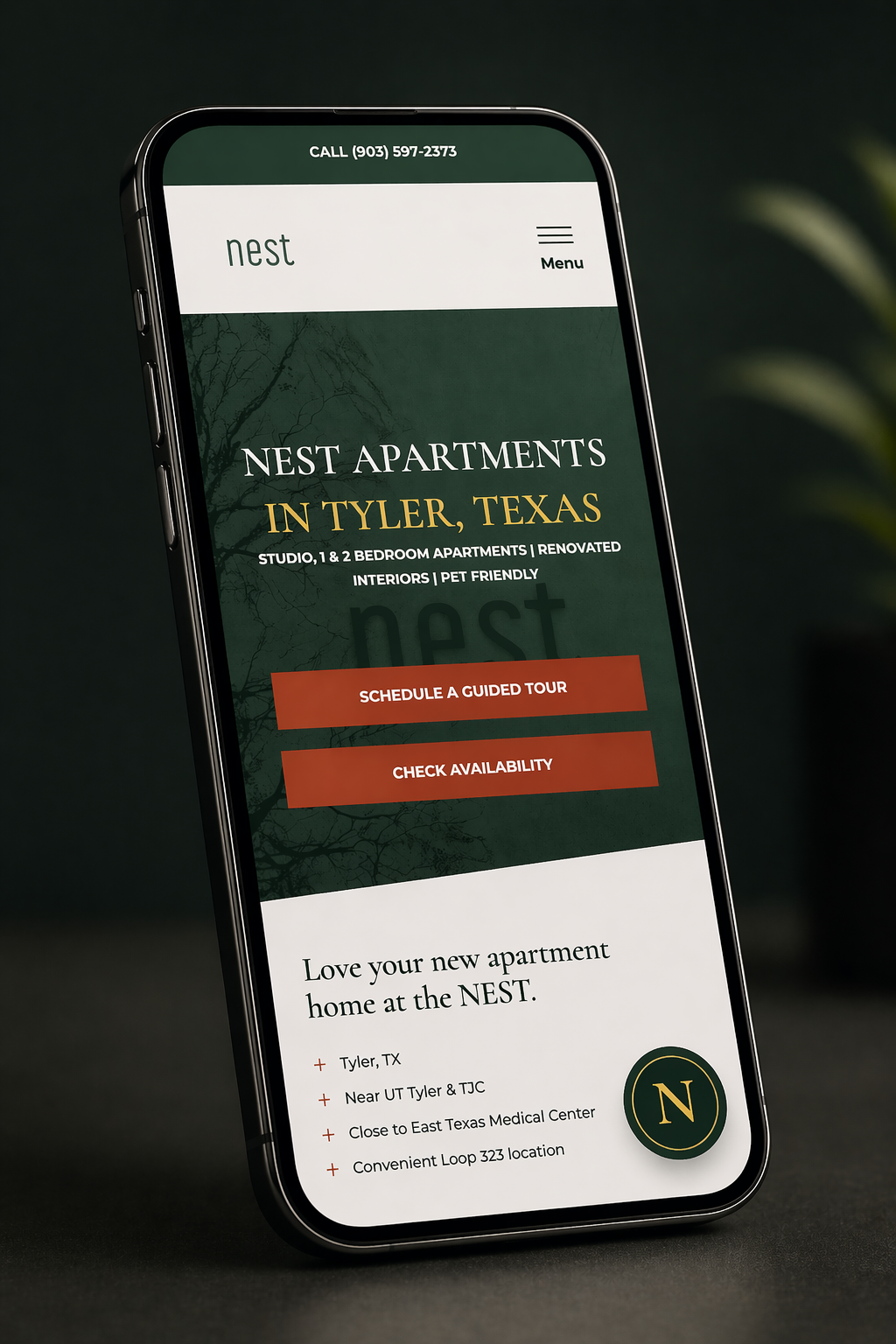 Apartment website homepage shown on a mobile phone